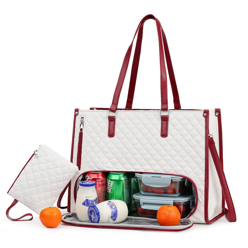 White quilted handbag with red straps containing snacks and drinks on a white background