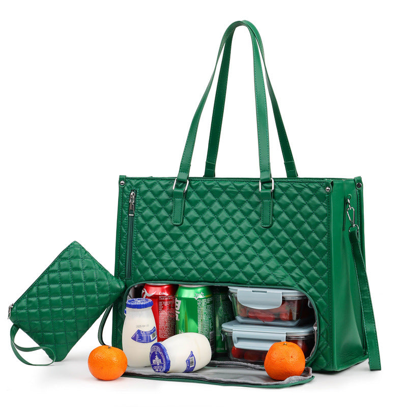 Green quilted handbag with compartments open, revealing food items on a white background