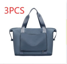 Blue handbag with '3PCS' text on a white background