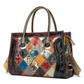 Multicolored patchwork handbag with textured patterns on a white background