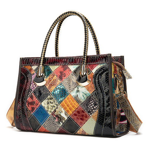 Multicolored patchwork handbag with textured patterns on a white background