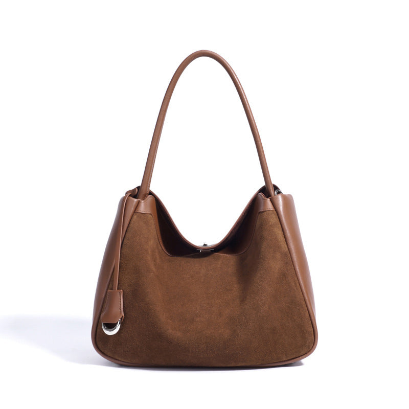 Brown handbag on a white background