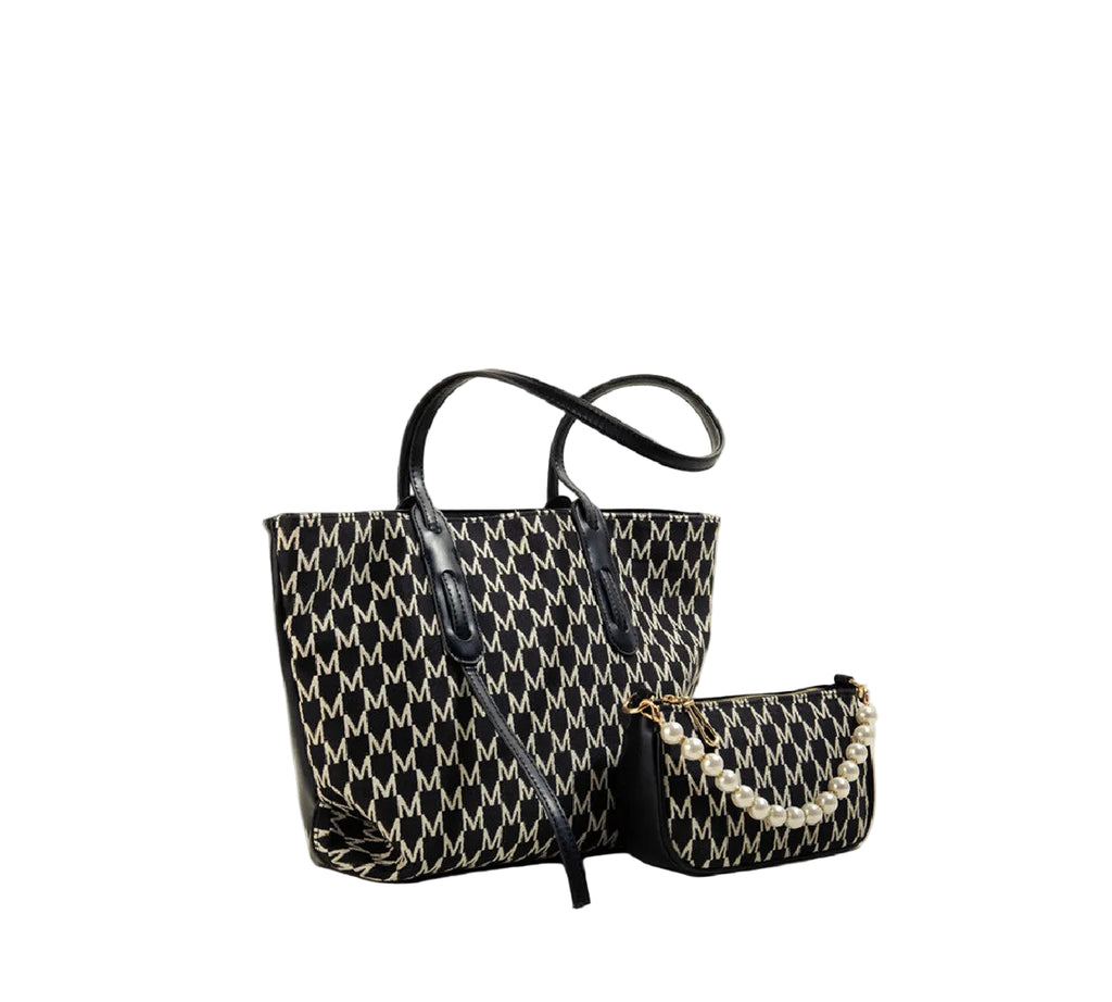 Black and white patterned handbag with matching pouch on a white background