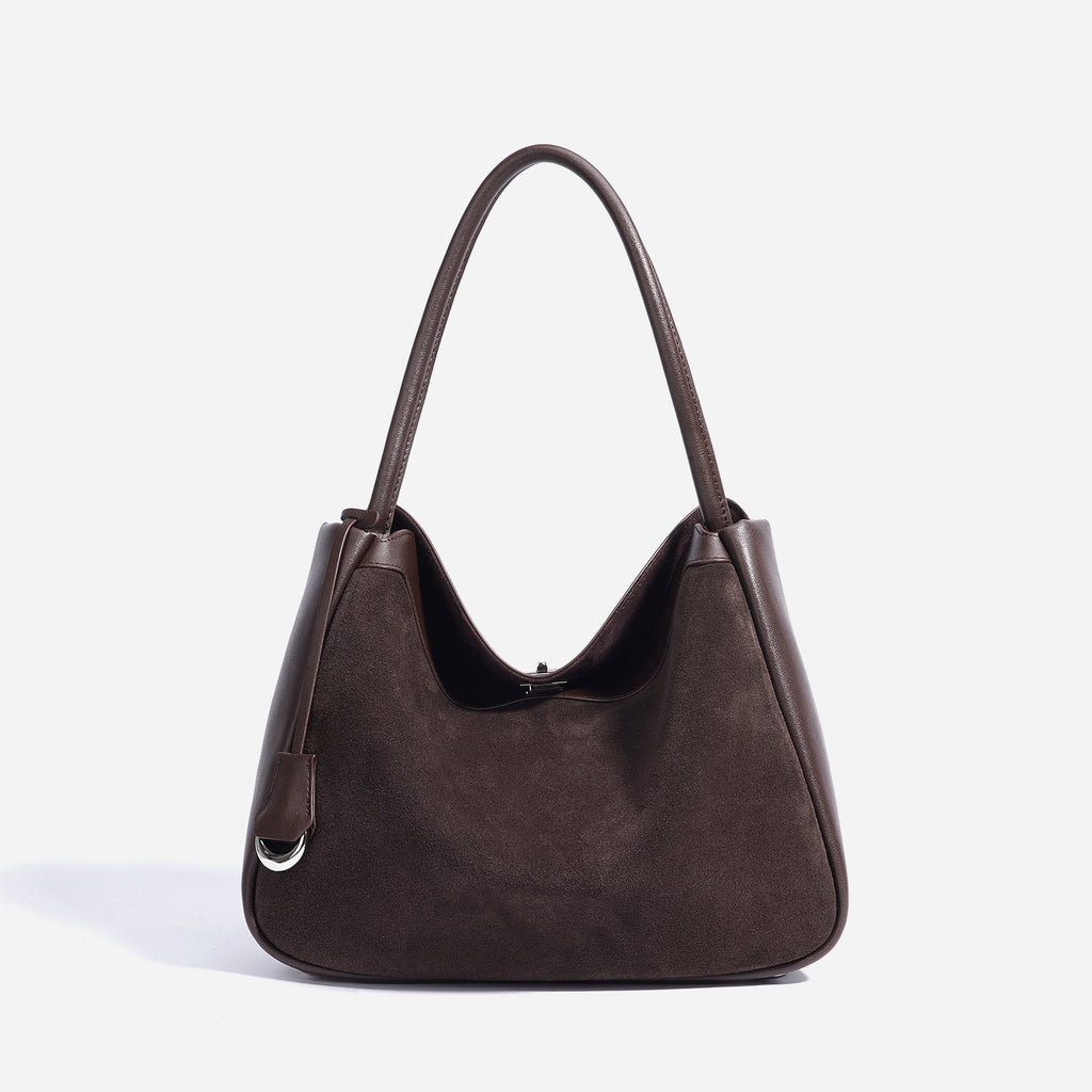 Brown handbag on a white background