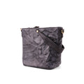 Gray textured crossbody bag on a white background