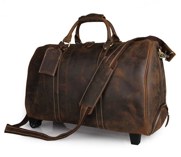 Brown leather duffel bag on a white background