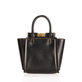 Black leather handbag with gold accents on a white background