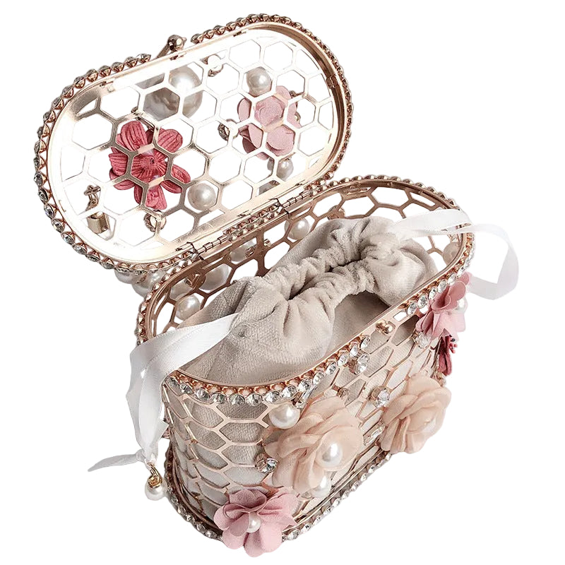 Decorative box with floral embellishments on a white background