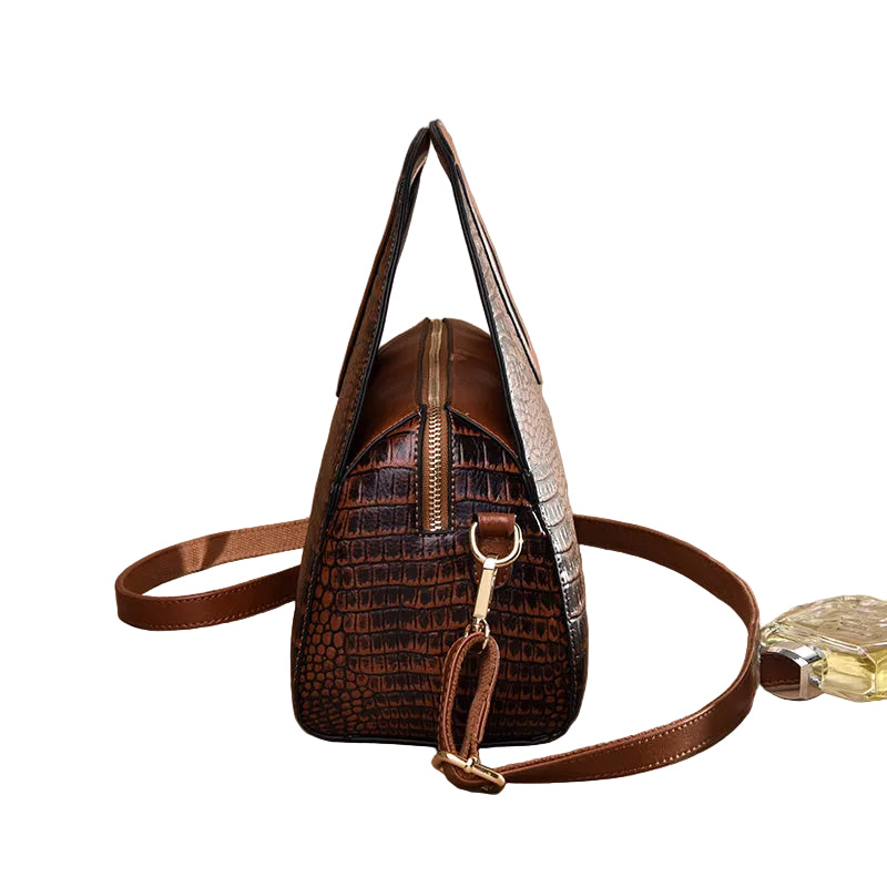 Brown textured handbag with a strap on a beige background