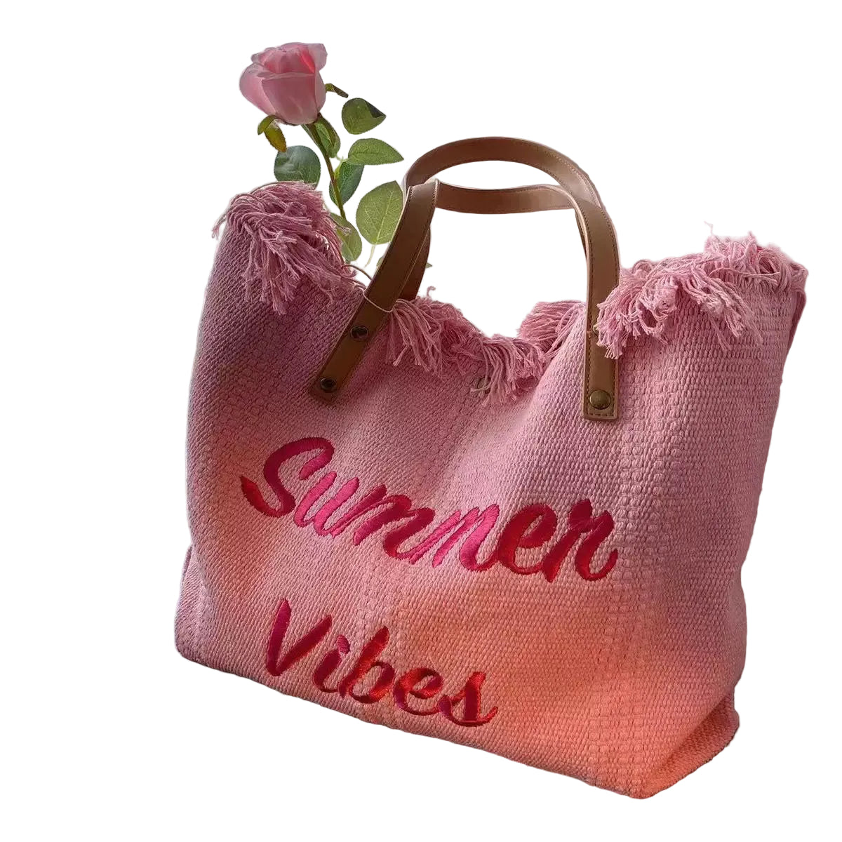 Pink tote bag with 'Summer Vibes' text on  a white background