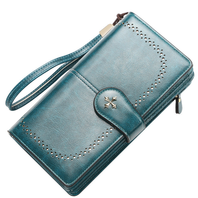 Blue wallet with wrist strap on a white background