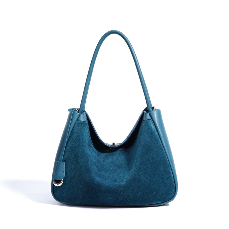 Blue handbag on a white background