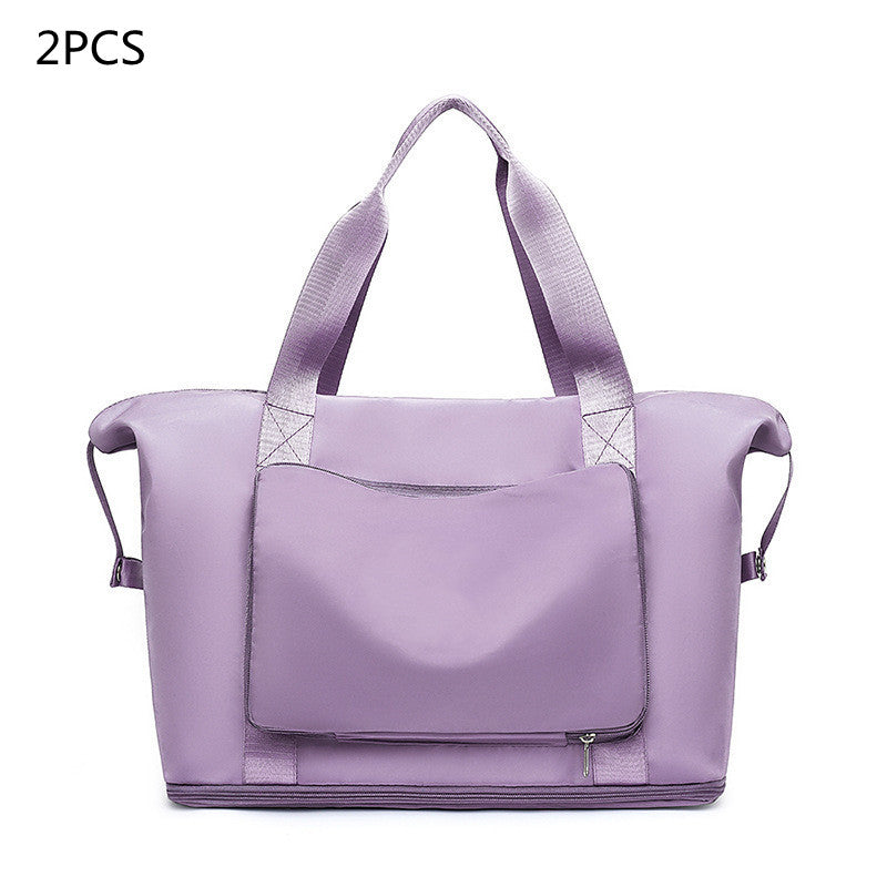 Purple tote bag with a smaller pocket on a white background