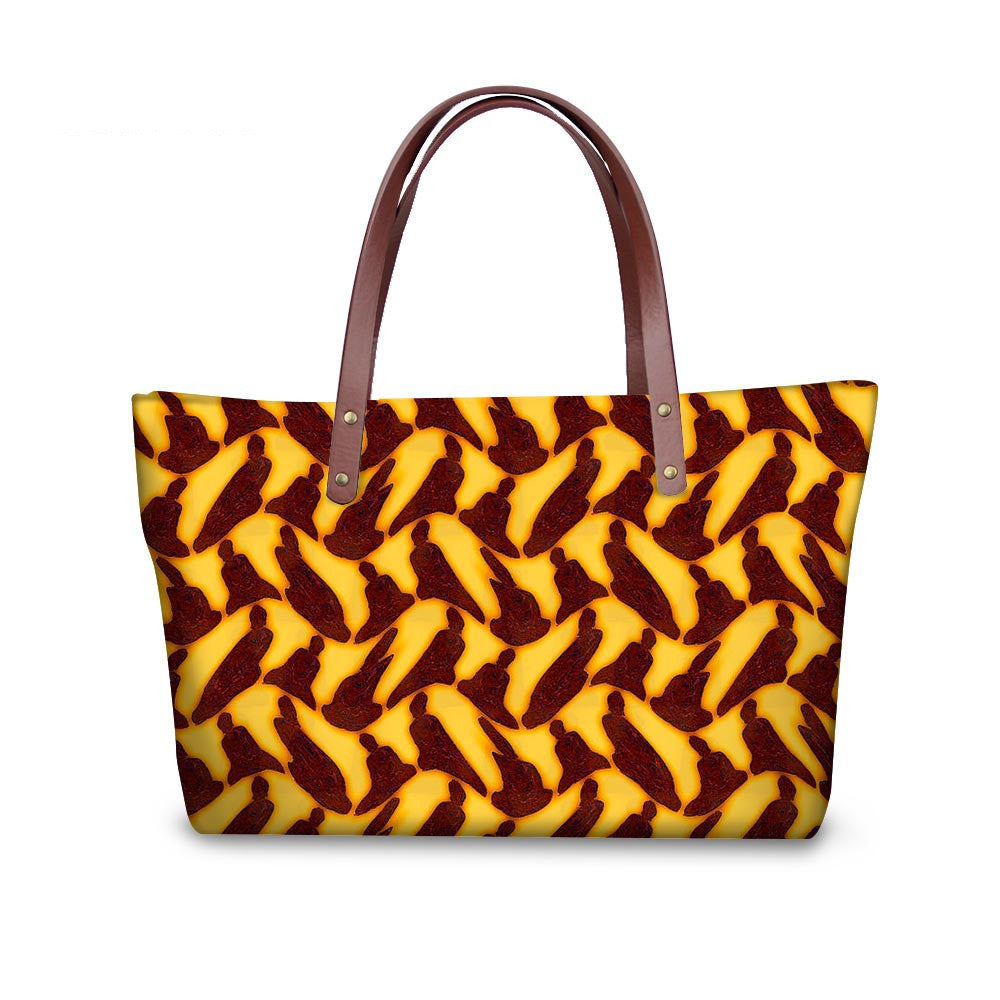 Yellow tote bag with brown pattern on a white background