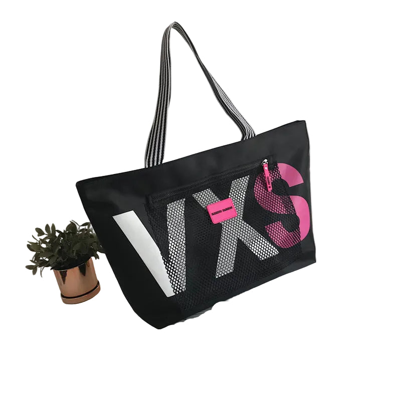 Black tote bag with 'YXS' branding on a white background