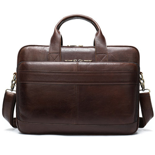 Brown leather briefcase with shoulder strap on a white background