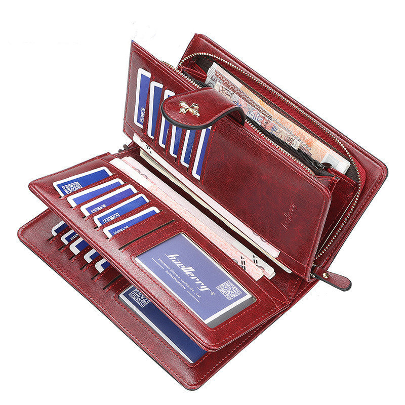 Red wallet with card slots and a visible brand logo on a white background
