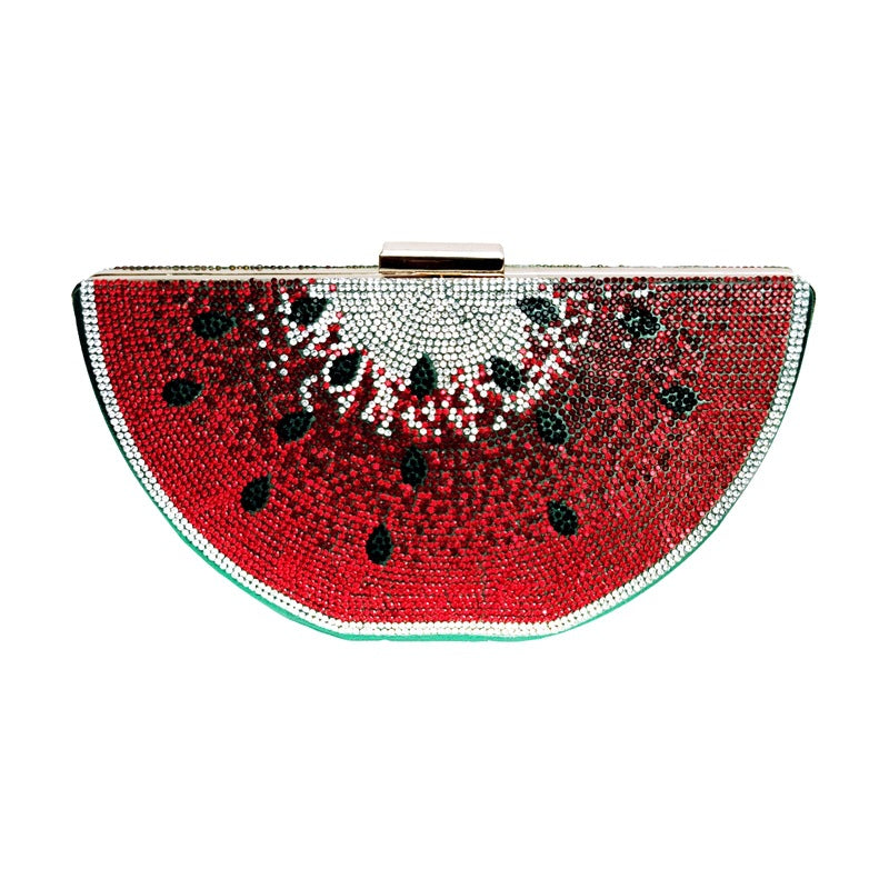 Watermelon-shaped clutch bag with rhinestone design on a white background