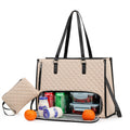 Beige tote bag with black handles and trim, containing snacks and drinks on a white background