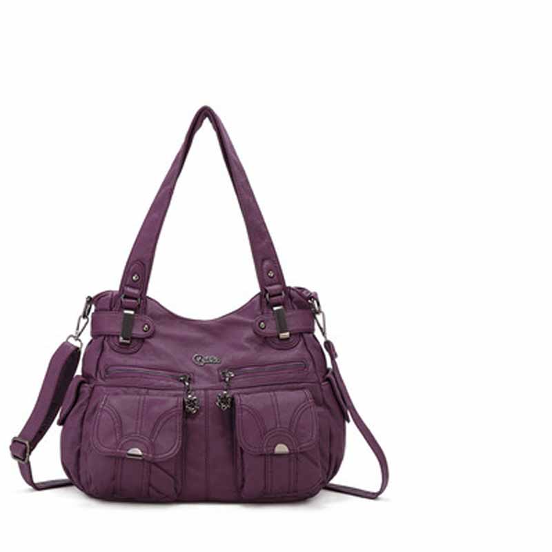 Purple handbag with multiple pockets and straps on a white background