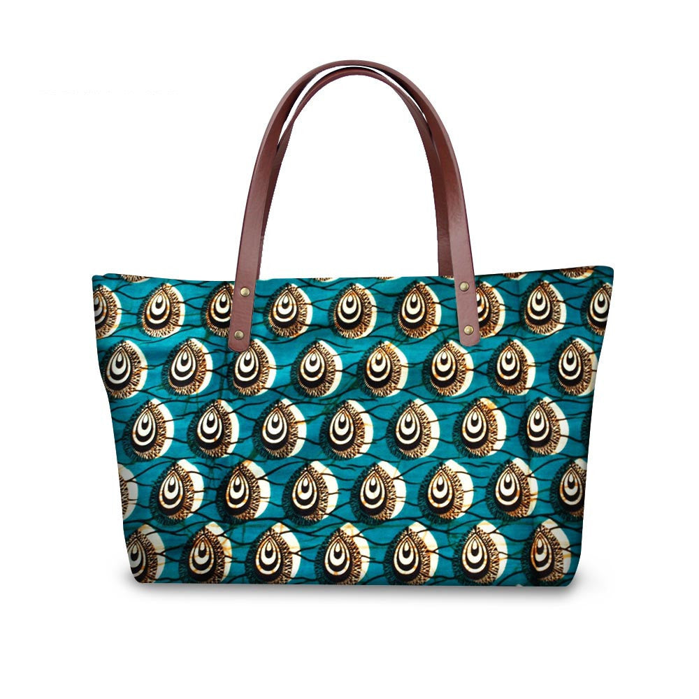 Tote bag with peacock feather pattern on a white background