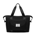 Black duffel bag with a visible brand label on a white background