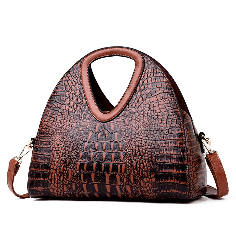 Brown textured handbag on a white background