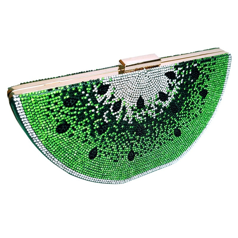 Green and black patterned clutch bag on a white background