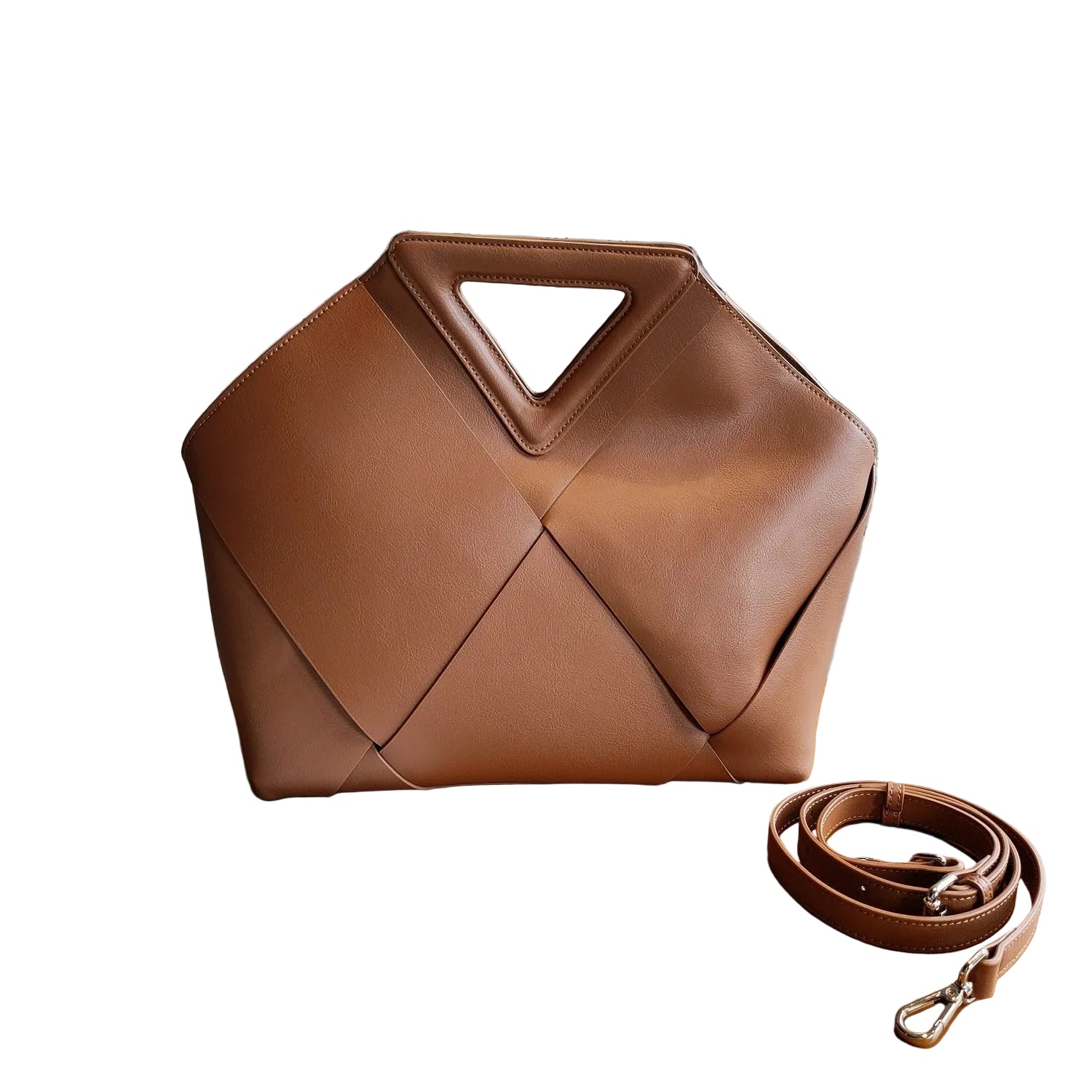 Brown leather handbag with a strap on a White background