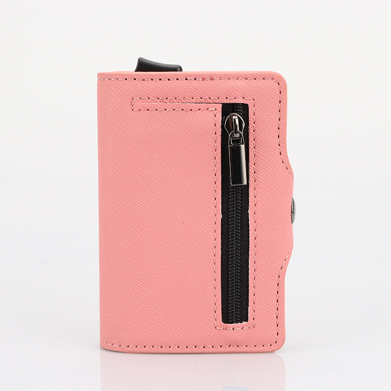 Pink wallet with a black zipper on a white background