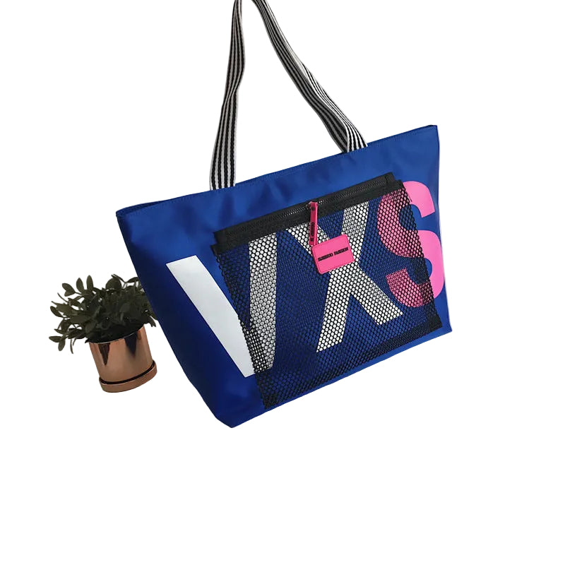 Blue tote bag with 'VKS' branding on a  white background
