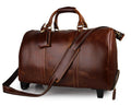 Brown leather duffel bag with wheels on a white background