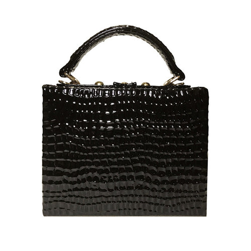 Black textured handbag with a handle on a white background