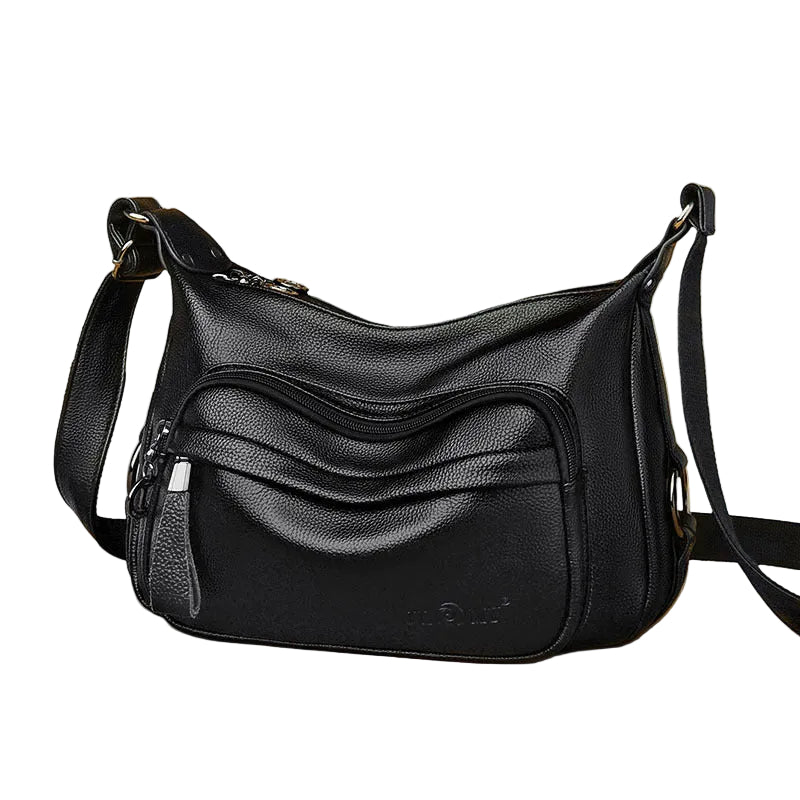 Black leather handbag on a white background