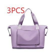 Purple handbag with a visible brand logo on a white background