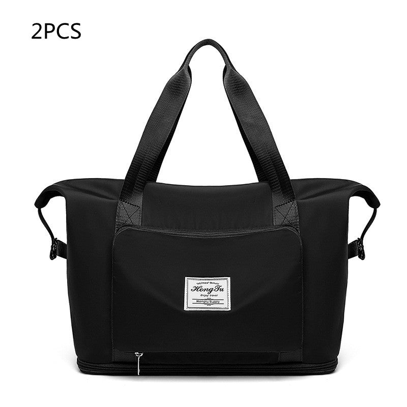 Black bag with a visible brand label on a white background